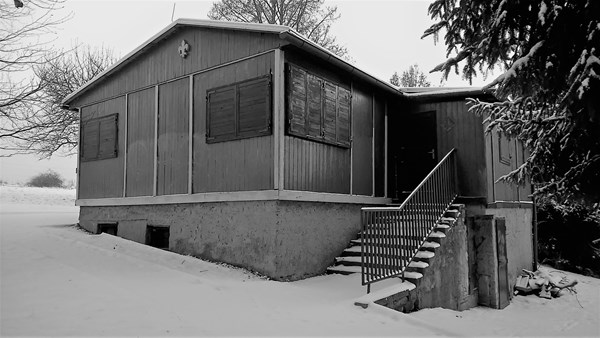 A photo of the historical scout clubhouse in Ricany (before the fire in September 2020)